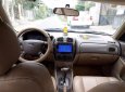 Ford Laser Ghia  2006 - Bán ô tô Ford Laser đời 2006, màu đen số tự động, 228tr