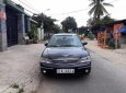Ford Laser Ghia  2006 - Bán ô tô Ford Laser đời 2006, màu đen số tự động, 228tr