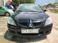 Mitsubishi Lancer 1.6 2004 - Cần bán Mitsubishi Lancer 1.6 sản xuất 2004, màu đen