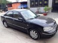 Ford Laser Ghia  2006 - Bán ô tô Ford Laser đời 2006, màu đen số tự động, 228tr