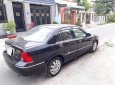 Ford Laser Ghia  2006 - Bán ô tô Ford Laser đời 2006, màu đen số tự động, 228tr