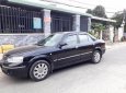 Ford Laser Ghia  2006 - Bán ô tô Ford Laser đời 2006, màu đen số tự động, 228tr