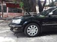 Ford Laser GHIA 1.8 MT 2005 - Bán ô tô Ford Laser GHIA 1.8 MT đời 2005, màu đen  