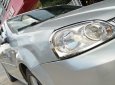 Daewoo Lacetti EX 1.6 MT 2005 - Cần bán gấp Daewoo Lacetti EX 1.6 MT năm sản xuất 2005, màu bạc