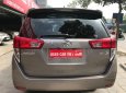 Toyota Innova 2.0E 2016 - Cần bán gấp Toyota Innova 2.0E năm 2016, màu nâu, 699 triệu