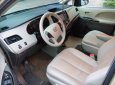 Toyota Sienna Le 2010 - Cần bán xe Toyota Sienna 2.7 LE 2010 màu vàng cát nhập Mỹ