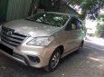 Toyota Innova E 2016 - Bán Toyota Innova E đời 2016, màu vàng, số sàn