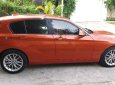 BMW 1 Series 116i  2013 - Bán BMW 1 Series 116i đời 2013, xe nhập, màu cam