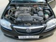 Mazda 323 GLX 2003 - Chính chủ bán Mazda 323 GLX năm 2003, màu đen