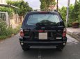 Ford Escape 2.3 AT 2004 - Cần bán gấp Ford Escape 2.3 AT năm sản xuất 2004, màu đen 