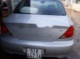 Kia Spectra 2004 - Cần bán xe Kia Spectra sản xuất 2004, màu bạc