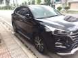 Hyundai Tucson   2.0L 2016 - Bán ô tô Hyundai Tucson 2.0L năm sản xuất 2016, màu đen giá tốt