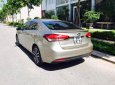 Kia Cerato 1.6AT 2016 - Bán Kia Cerato 1.6AT sản xuất 2016, màu kem (be), giá 585tr