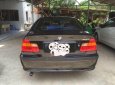 BMW 3 Series 318i  2004 - Cần bán lại xe BMW 3 Series 318i 2004, màu đen, xe nhập xe gia đình, giá tốt