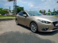 Mazda 3 1.5 AT 2016 - Cần bán xe Mazda 3 1.5 AT năm sản xuất 2016, màu vàng 