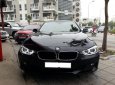 BMW 3 Series 320i 2015 - Cần bán BMW 3 Series 320i năm sản xuất 2015, màu đen, xe nhập