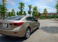 Mazda 3 1.5 AT 2016 - Cần bán xe Mazda 3 1.5 AT năm sản xuất 2016, màu vàng 