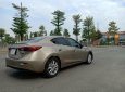 Mazda 3 1.5 AT 2016 - Cần bán xe Mazda 3 1.5 AT đời 2016, màu vàng  