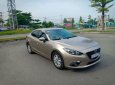 Mazda 3 1.5 AT 2016 - Cần bán xe Mazda 3 1.5 AT đời 2016, màu vàng  