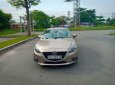 Mazda 3 1.5 AT 2016 - Cần bán xe Mazda 3 1.5 AT đời 2016, màu vàng  