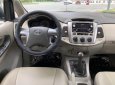 Toyota Innova 2.0E 2014 - Cần bán lại xe Toyota Innova 2.0E đời 2014, màu bạc số sàn