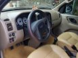 Ford Escape 2.0 MT 2004 - Bán xe Ford Escape sản xuất năm 2004, màu đen