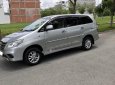 Toyota Innova 2.0E 2014 - Cần bán lại xe Toyota Innova 2.0E đời 2014, màu bạc số sàn