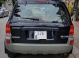 Ford Escape 2.0 MT 2004 - Bán xe Ford Escape sản xuất năm 2004, màu đen