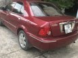 Ford Laser   1.6 MT  2002 - Cần bán gấp Ford Laser 1.6 MT năm 2002, mới thay lốp Michelin, xe đi rất tiết kiệm, không hỏng vặt