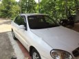 Daewoo Lanos 2005 - Cần bán gấp Daewoo Lanos sản xuất 2005, màu trắng, 100tr