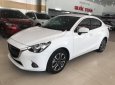 Mazda 2 1.5 AT 2016 - Cần bán lại xe Mazda 2 1.5 AT đời 2016, màu trắng như mới