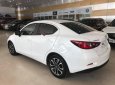 Mazda 2 1.5 AT 2016 - Cần bán lại xe Mazda 2 1.5 AT đời 2016, màu trắng như mới