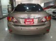 Toyota Corolla altis 1.8AT 2009 - Cần bán Toyota Corolla altis 1.8AT 2009, vàng cát