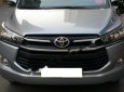 Toyota Innova 2.0E 2016 - Bán Toyota Innova 2.0E năm 2016, màu bạc số sàn 