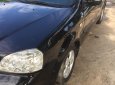 Daewoo Lacetti MT 2005 - Cần bán xe Daewoo Lacetti MT đời 2005, màu đen chính chủ, giá tốt