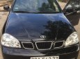 Daewoo Lacetti MT 2005 - Cần bán xe Daewoo Lacetti MT đời 2005, màu đen chính chủ, giá tốt