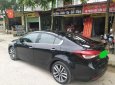 Kia Cerato 1.6AT  2016 - Cần bán xe Kia Cerato 1.6AT năm sản xuất 2016, màu đen, giá tốt