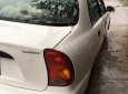 Daewoo Lanos SX 2002 - Bán xe Daewoo Lanos SX sản xuất 2002, màu trắng 