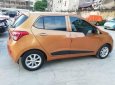 Hyundai Grand i10 2017 - Bán xe Hyundai Grand i10 đời 2017, màu vàng cam