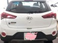 Hyundai i20 Active AT 2016 - Cần bán gấp Hyundai i20 Active AT 2016, màu trắng, xe nhập