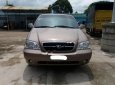 Kia Carnival GS  2009 - Bán xe Kia Carnival GS đời 2009, màu nâu xe gia đình giá cạnh tranh