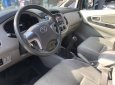 Toyota Innova E 2014 - Nhà cần thanh lý Innova 2014, số sàn màu bạc cọp