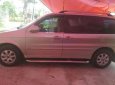 Kia Carnival 2009 - Bán Kia Carnival sản xuất 2009, màu bạc  