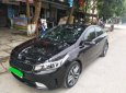 Kia Cerato 1.6AT  2016 - Cần bán xe Kia Cerato 1.6AT năm sản xuất 2016, màu đen, giá tốt