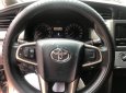 Toyota Innova 2.0E 2016 - Cần bán lại xe Toyota Innova 2.0E sản xuất năm 2016, màu nâu số sàn