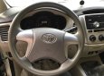 Toyota Innova 2.0E 2014 - Cần bán gấp Toyota Innova 2.0E năm sản xuất 2014, màu bạc chính chủ