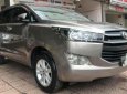 Toyota Innova 2.0E 2016 - Cần bán lại xe Toyota Innova 2.0E sản xuất năm 2016, màu nâu số sàn