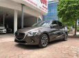 Mazda 2 1.5AT 2015 - Cần bán gấp Mazda 2 1.5AT đời 2015, màu nâu, 505tr