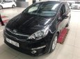 Kia Rio 1.4 AT 2016 - Cần bán lại xe Kia Rio 1.4 AT sản xuất năm 2016, màu đen, xe nhập