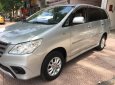 Toyota Innova 2.0E 2014 - Cần bán gấp Toyota Innova 2.0E năm sản xuất 2014, màu bạc chính chủ